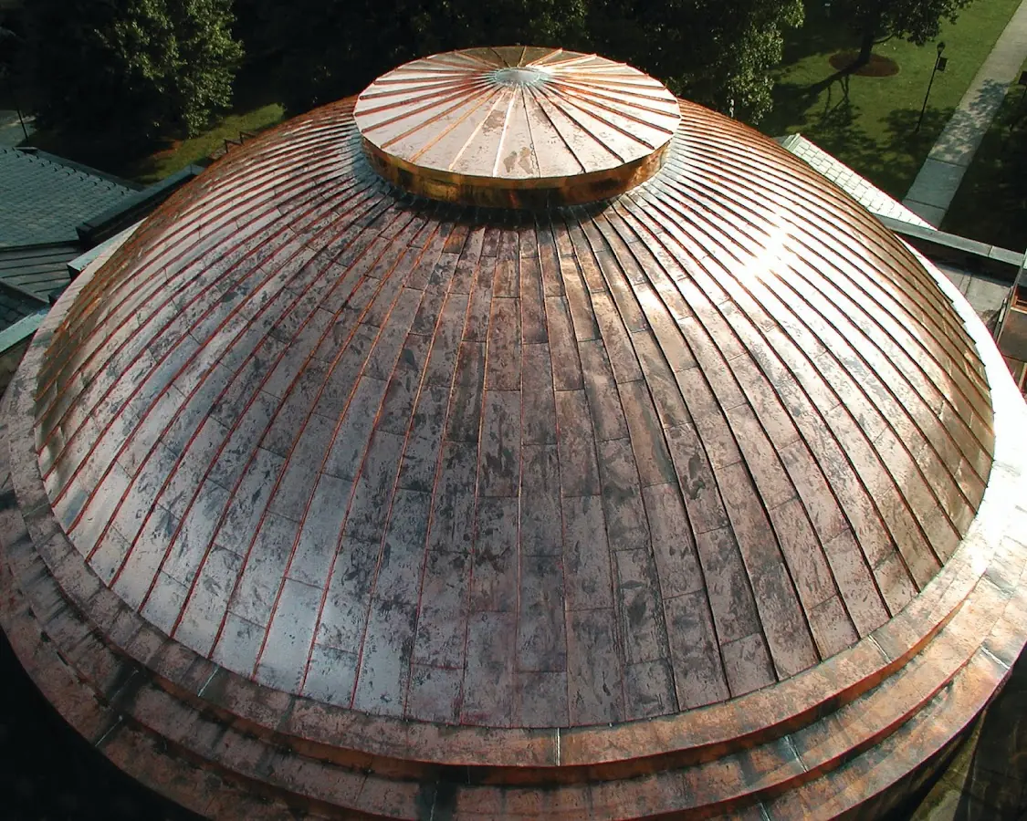 Craftsman Roofing crew installing a new roof in Boylston Center